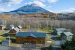 Nestled against a breathtaking mountain backdrop, this stunning property boasts a collection of charming, modern homes.