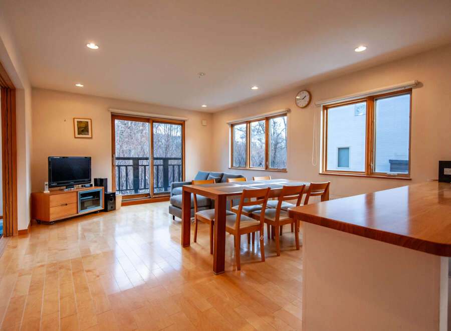 This stunning property boasts an open-plan living area with hardwood floors, large windows offering abundant natural light, and a modern kitchen with sleek countertops.