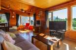 Cozy wooden cabin with breathtaking views.