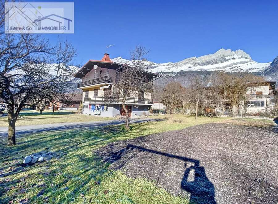 Discover a charming property nestled in a picturesque mountain setting.