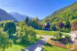 Discover breathtaking mountain views from this charming property.