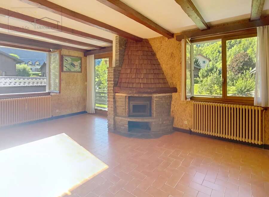 Discover the charm of this cozy property featuring a stunning fireplace, perfect for creating a warm and inviting atmosphere.