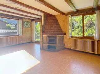 Discover the charm of this cozy property featuring a stunning fireplace, perfect for creating a warm and inviting atmosphere.