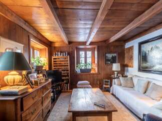 Rustic charm meets modern comfort in this unique wooden chalet.