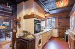 Rustic charm meets modern convenience in this unique kitchen.