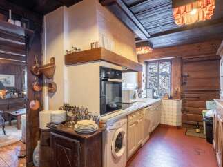 Rustic charm meets modern convenience in this unique kitchen.