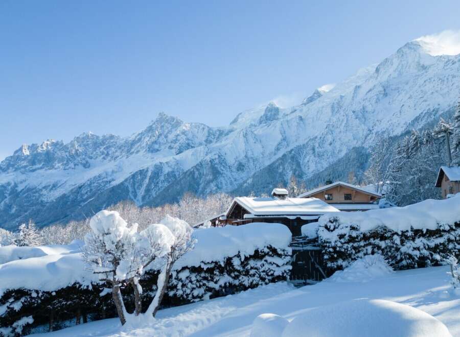 This stunning chalet offers breathtaking views of the snow-capped French Alps.