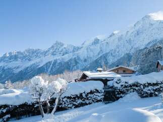 This stunning chalet offers breathtaking views of the snow-capped French Alps.