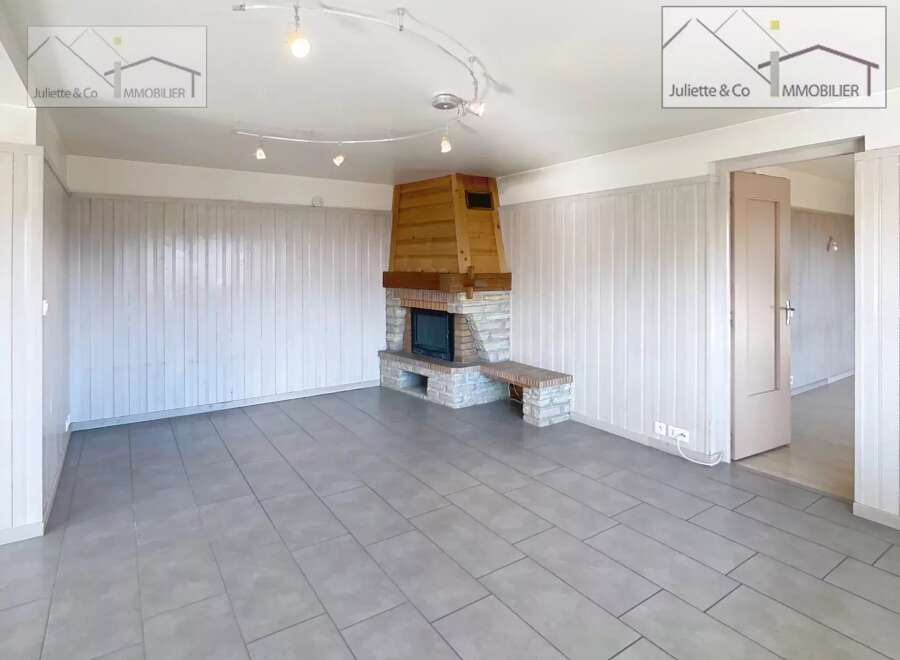 Discover this charming property featuring a cozy fireplace, perfect for those chilly evenings.