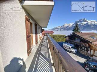 Enjoy breathtaking mountain views from this charming property.