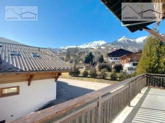 Enjoy breathtaking mountain views from this charming property.