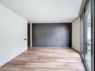 This stunning property boasts a spacious, bright interior with sleek, modern finishes.