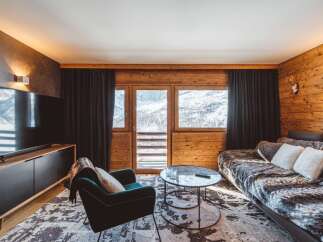 Experience the ultimate mountain retreat in this cozy living room.