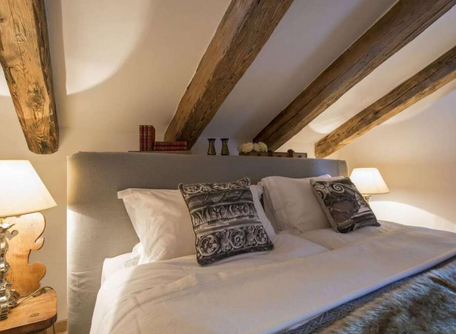 Experience rustic charm in this cozy bedroom.