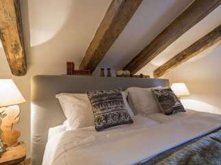 Experience rustic charm in this cozy bedroom.
