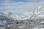 Experience the breathtaking beauty of a snow-covered mountain village.