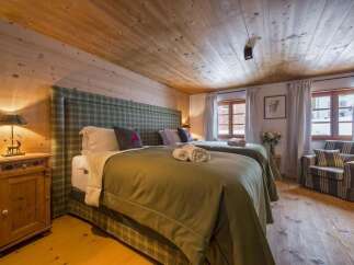 Experience rustic charm in this cozy bedroom.