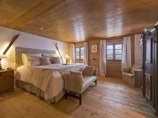 Experience rustic charm in this cozy bedroom.
