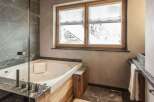 Indulge in the ultimate relaxation in this luxurious bathroom.