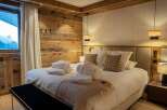 Experience luxury and comfort in this stunning bedroom.