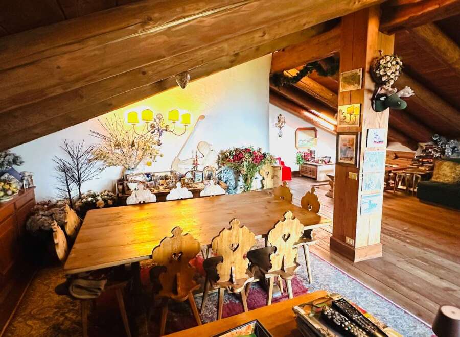 This charming property boasts a unique, rustic interior with exposed wooden beams and a cozy atmosphere.