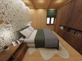 This cozy bedroom features a unique deer-themed wallpaper, creating a rustic and inviting atmosphere.