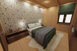 This cozy bedroom features a unique deer-themed wallpaper, creating a rustic and inviting atmosphere.