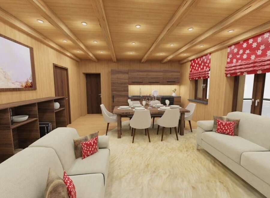 Experience the warmth of this stunning living space, featuring a cozy seating area and a dining space perfect for gatherings.