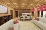 Experience the warmth of this stunning living space, featuring a cozy seating area and a dining space perfect for gatherings.
