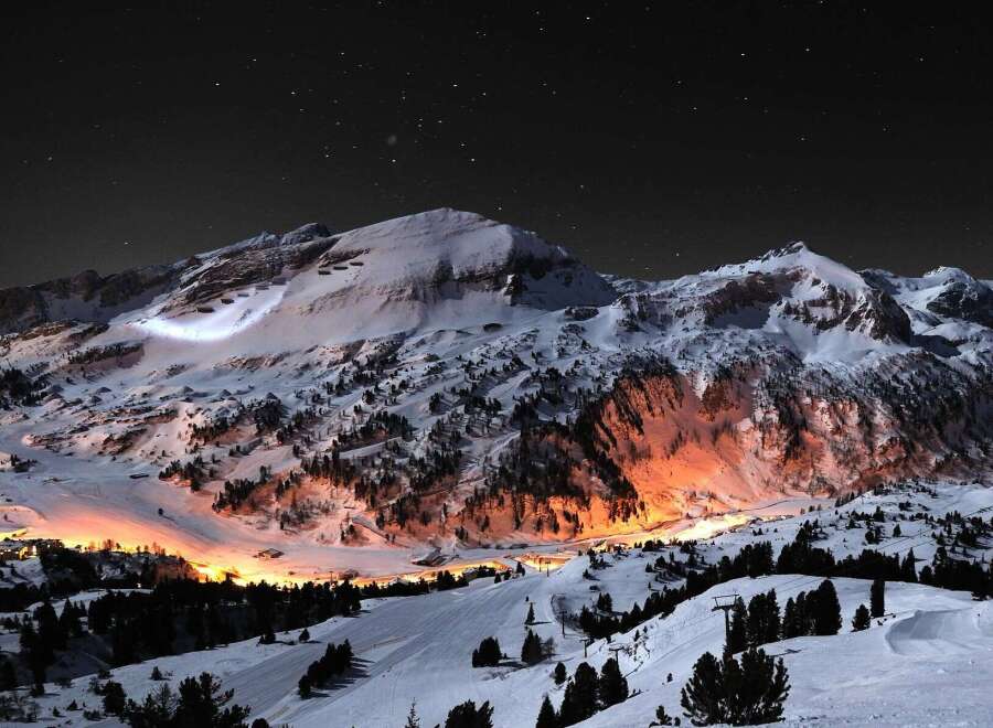 Experience the magic of a winter wonderland in this stunning nightscape.