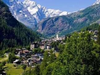 Nestled in a picturesque mountain valley, this property offers stunning views of snow-capped peaks and lush green forests.