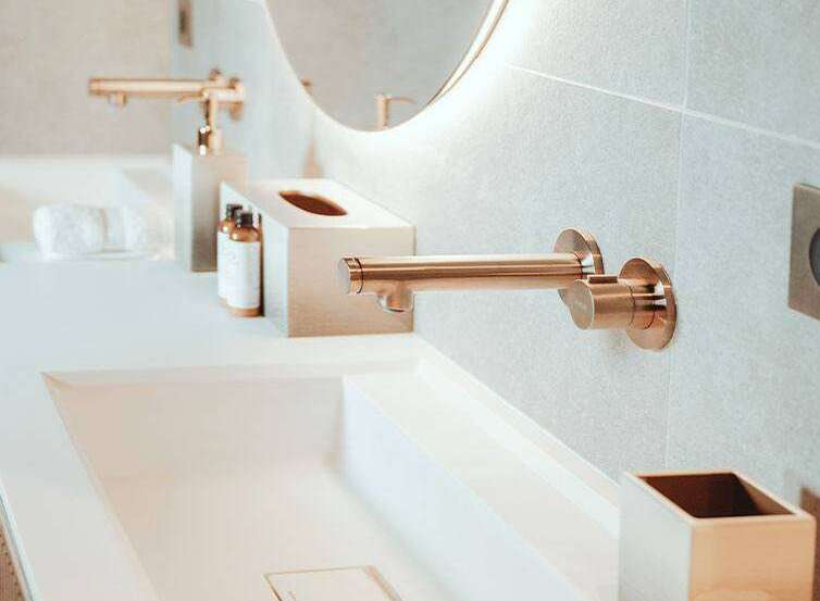 Indulge in the luxurious bathroom featuring a sleek, modern design.