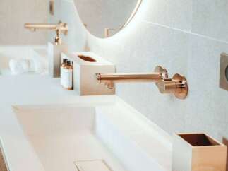 Indulge in the luxurious bathroom featuring a sleek, modern design.