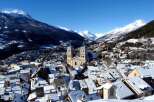 Discover the charm of this picturesque mountain town, nestled amidst snow-capped peaks.