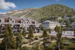 Discover a stunning architectural masterpiece nestled in a picturesque mountain setting.