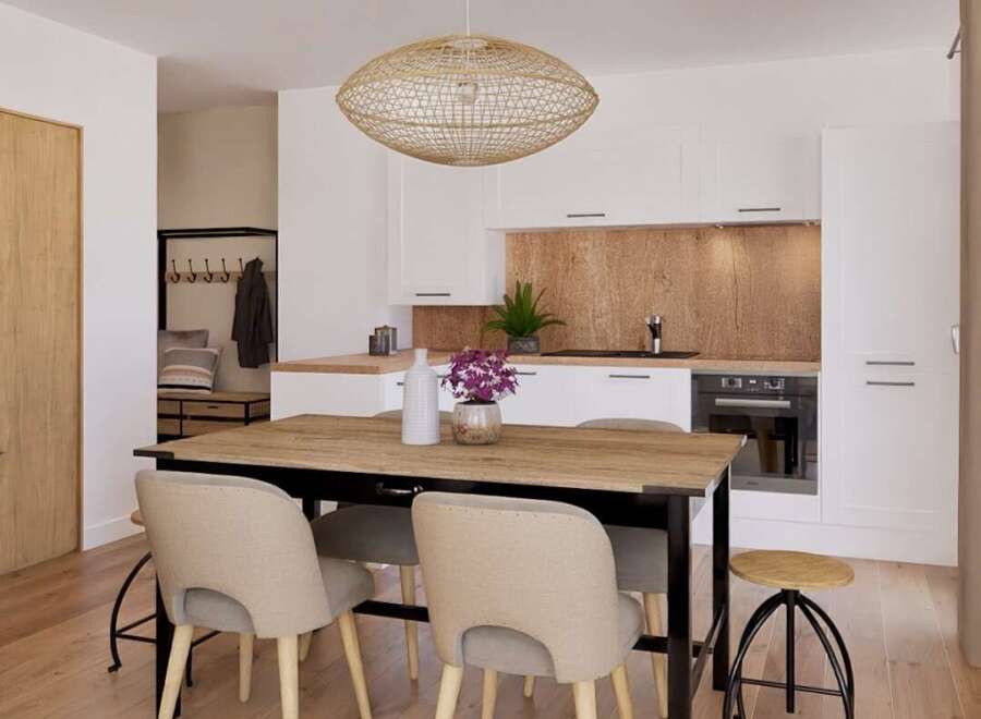 Stylish apartment featuring an open-plan kitchen and dining area with wooden accents.