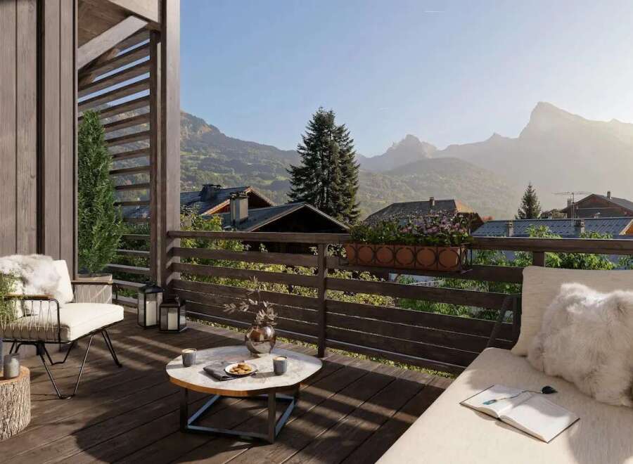 Mountain view balcony with modern furniture and wooden deck.