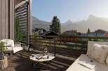 Mountain view balcony with modern furniture and wooden deck.
