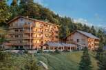 Discover your mountain retreat in this stunning chalet-style hotel nestled amidst breathtaking scenery.
