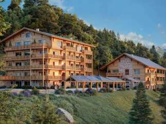 Discover your mountain retreat in this stunning chalet-style hotel nestled amidst breathtaking scenery.