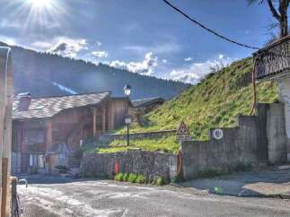 Charming wooden chalet nestled in the French Alps, offering breathtaking mountain views.