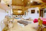 Discover the charm of this stunning property, featuring a unique wooden interior and a cozy, inviting atmosphere.