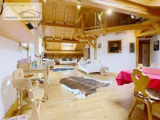 Discover the charm of this stunning property, featuring a unique wooden interior and a cozy, inviting atmosphere.