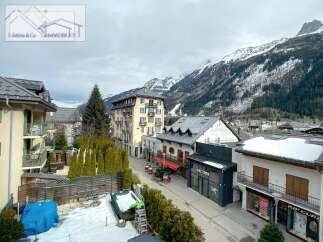 Discover a charming property nestled in a picturesque mountain town.