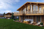 Luxury chalet with stunning mountain views and private hot tub.