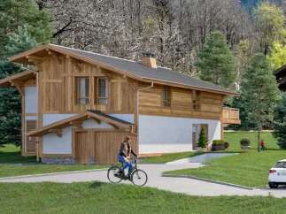 This stunning chalet boasts a unique blend of modern and traditional design, featuring a spacious layout and high-quality finishes.