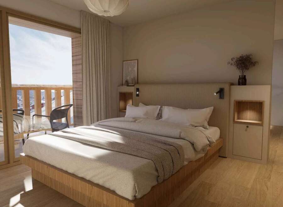 Wake up to breathtaking mountain views from this cozy bedroom.