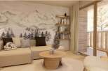 Cozy living room with a stunning mountain view wallpaper, creating a serene atmosphere.