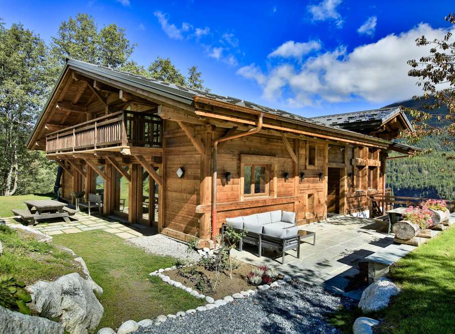 Experience the epitome of alpine luxury in this stunning wooden chalet.
