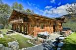 Experience the epitome of alpine luxury in this stunning wooden chalet.